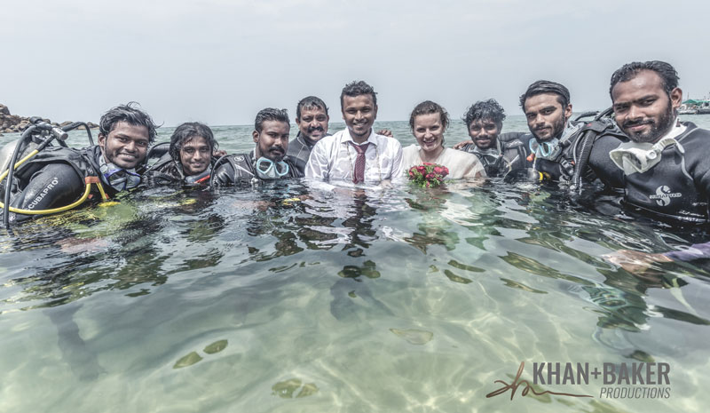 Nikhil and Eunika escorted into the ocean by the team of divers from Bond Safari, Thiruvananthapuram
