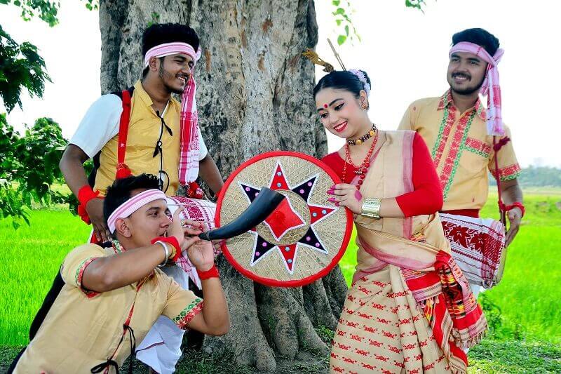 People celebrating rangoli bihu festival